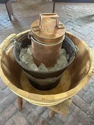 copper sorbetiere sitting in bucket of ice