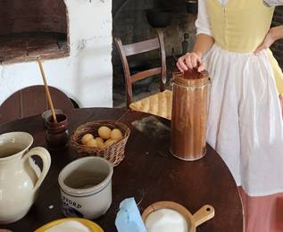 a copper sorbetiere on table with ingredients